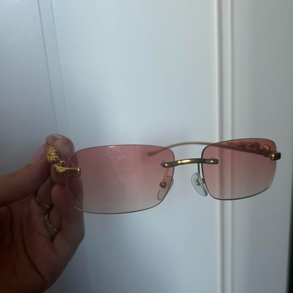 Elegant Pink and Gold Rimless Sunglasses